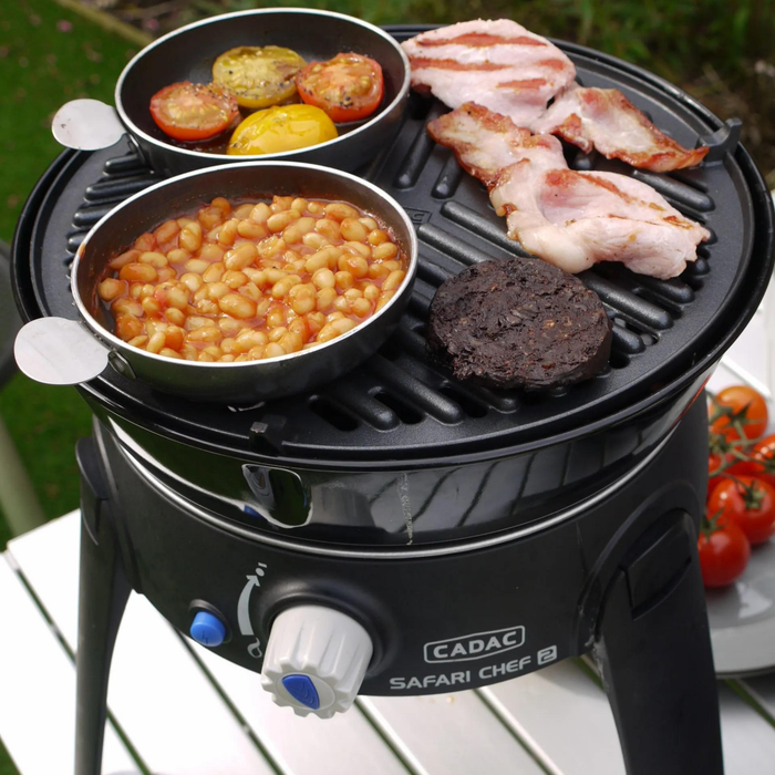 Cadac Safari Chef 30 Pro QR - LPG Gas BBQ shown cooking food