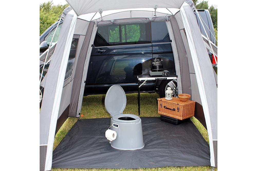 Outdoor Revolution Outhouse Handi Mid Driveaway Awning interior shown with example camping items